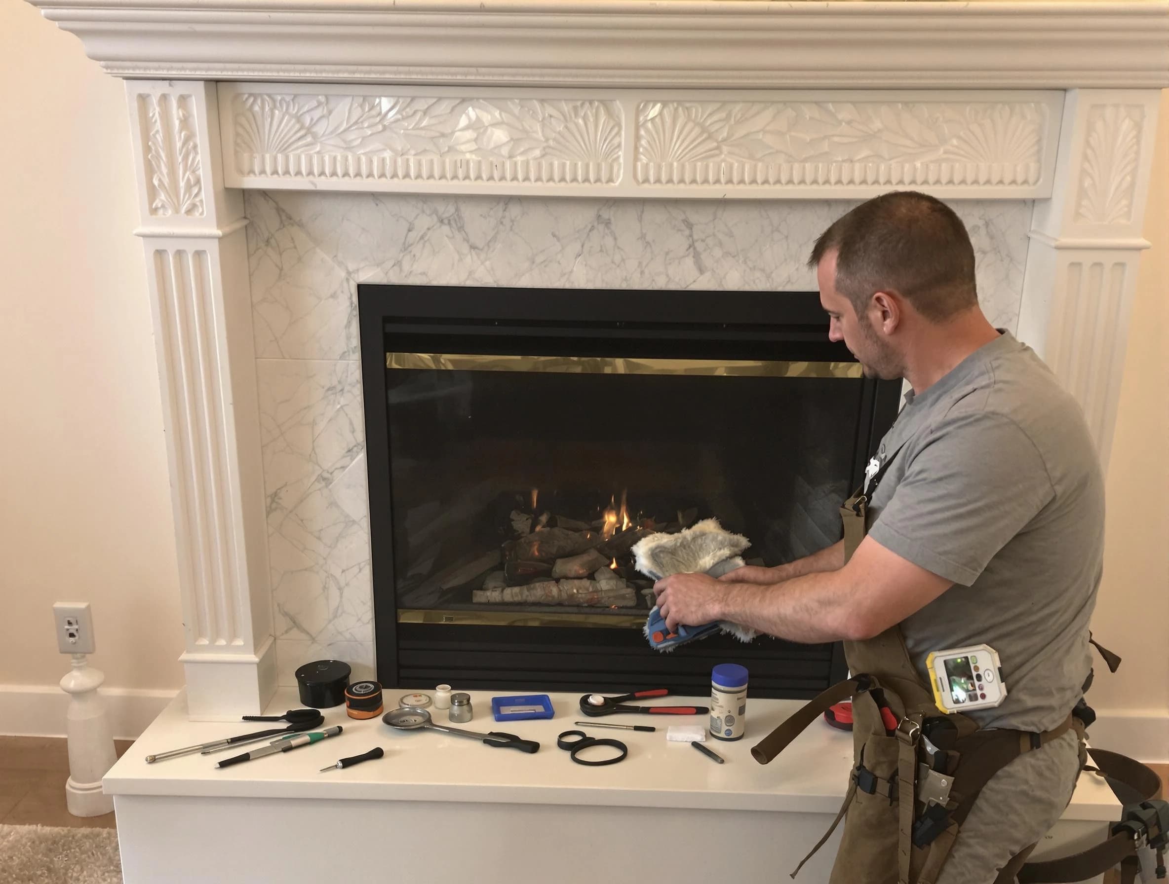 East Point Chimney Sweep performing fireplace maintenance in East Point, GA
